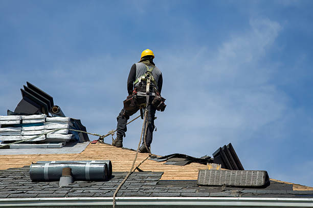 Professional Gutter Installation technician working in Toledo, IA